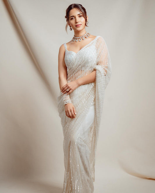 "Drape yourself in ethereal elegance with our Butterfly Mono Net Silk Saree collection, where each intricate weave tells a story of timeless grace and beauty."