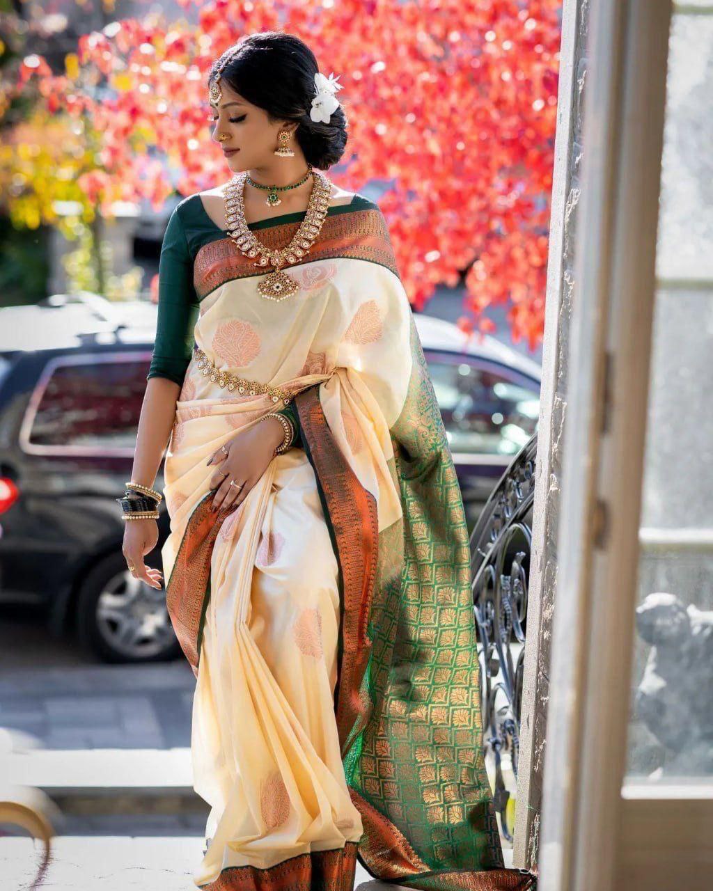 "Wrap yourself in timeless elegance with our Banarasi soft silk sarees, weaving stories of tradition and grace with every drape."