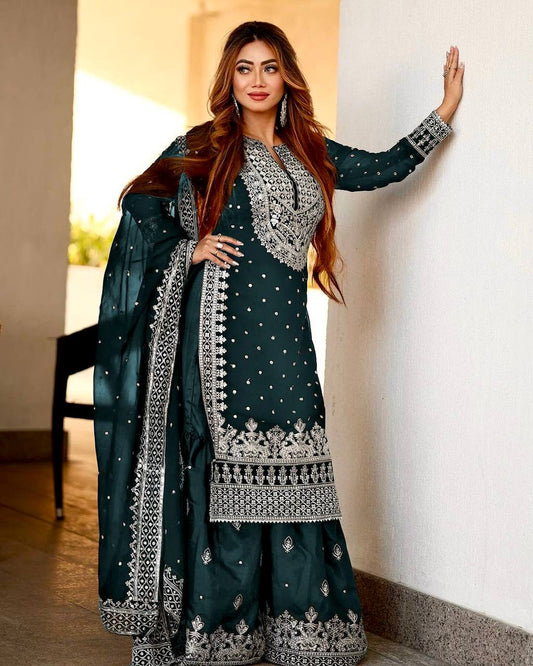 "Elevate your style with intricate craftsmanship. Explore our online collection of heavy embroidery sequence work top, gharara, and dupatta sets for an enchanting look."
