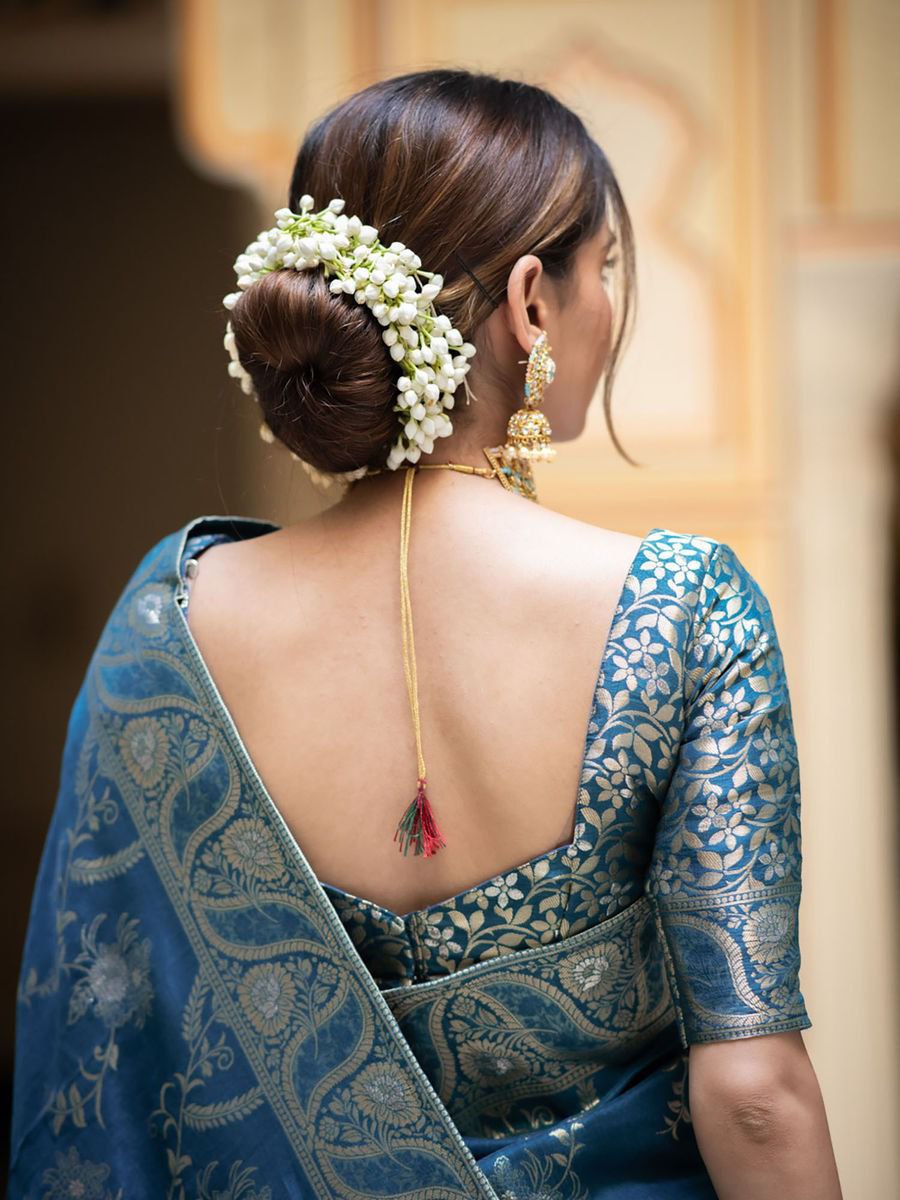 "Elegance woven with tradition: Embrace the timeless allure of our New Silk sarees."