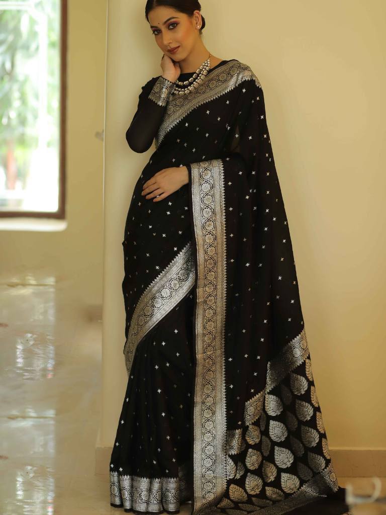 "Wrap yourself in elegance with our soft cotton silk sarees."