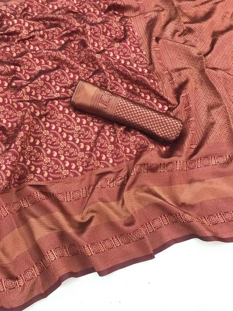 "Radiant Elegance: Drape Yourself in Soft Silk and Copper Jari."