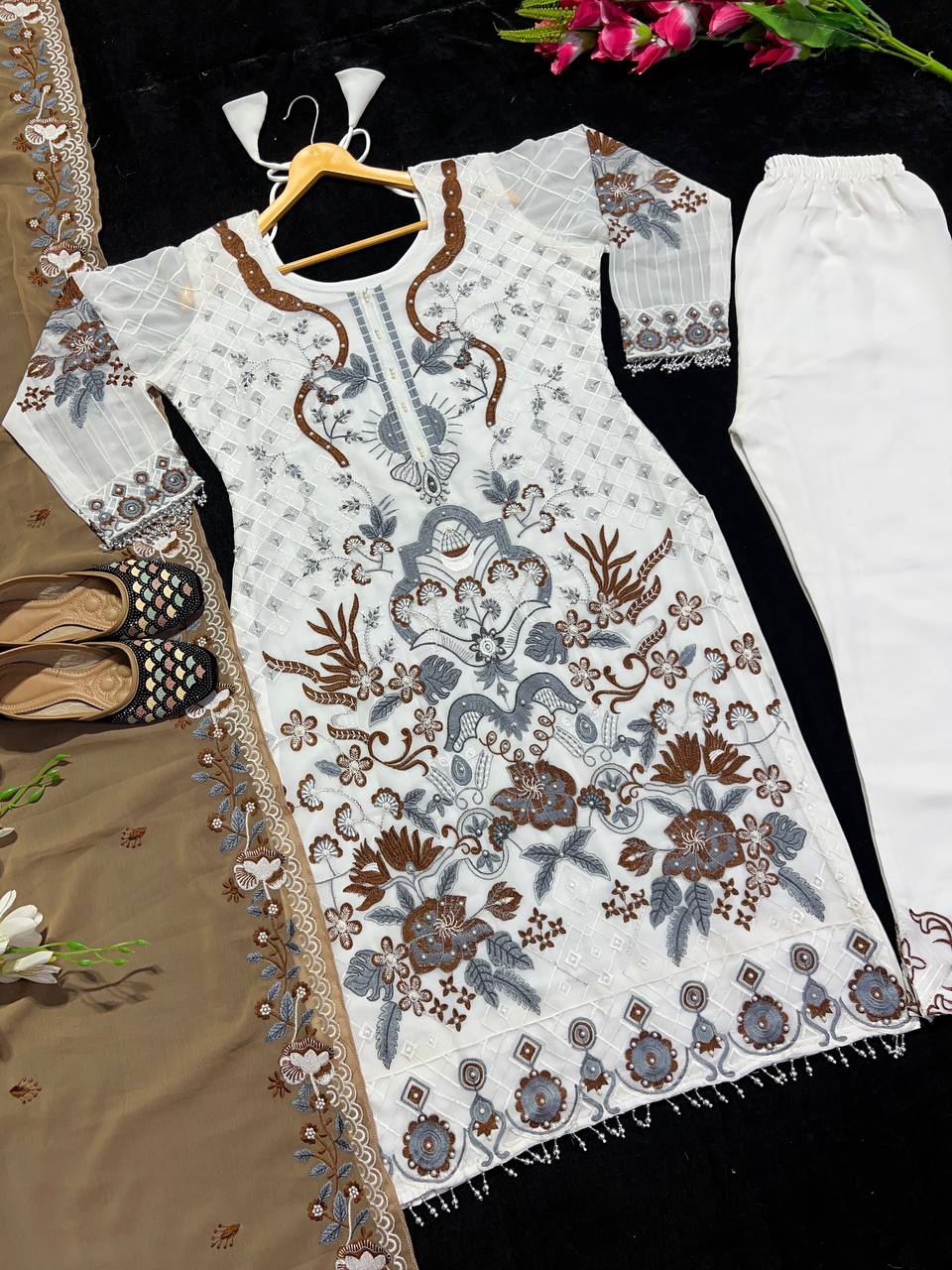 "Elevate your style with our Fox Georgette Top, Plazo, and Dupatta set – where elegance meets comfort."