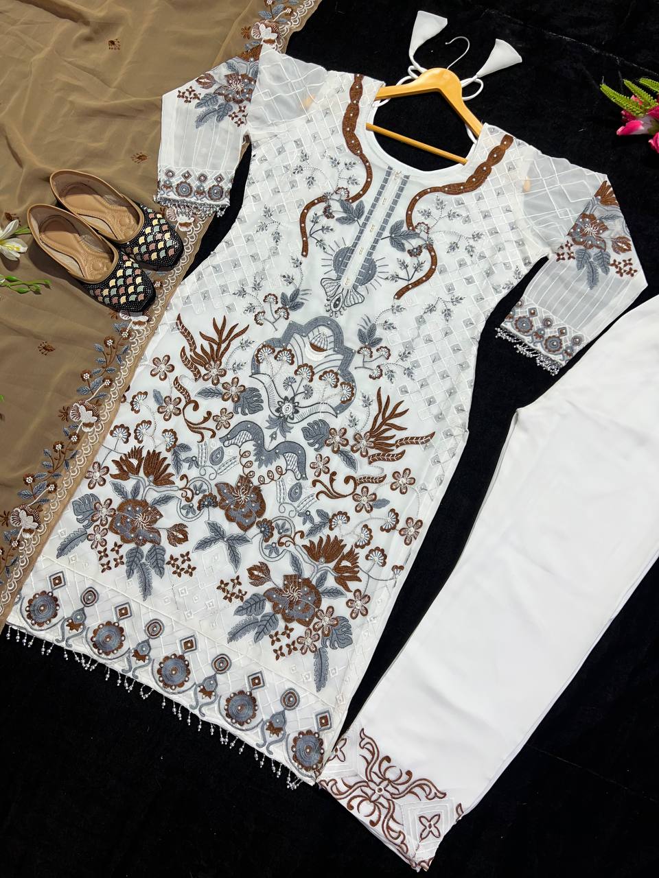 "Elevate your style with our Fox Georgette Top, Plazo, and Dupatta set – where elegance meets comfort."