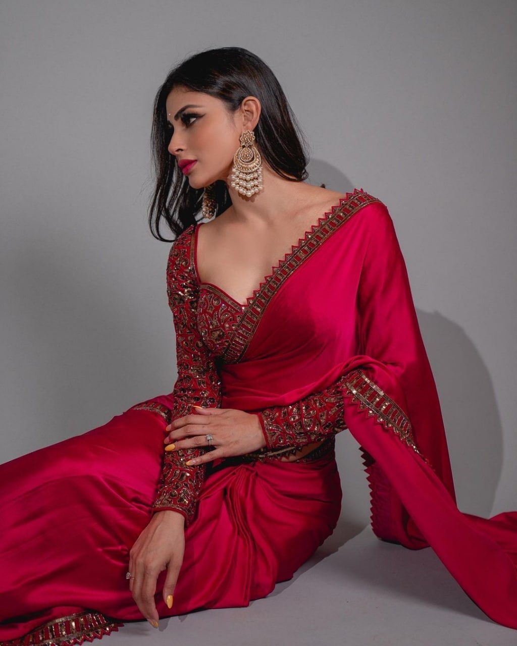 "Elegance in Every Drape: Embrace the Passionate Red of Georgette Sarees"